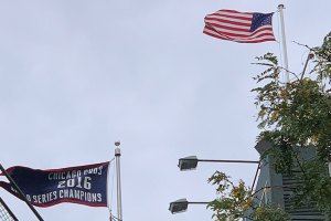 American flag and World Series banner fly in air