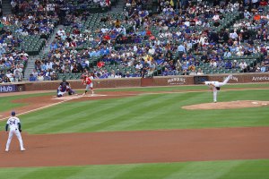 Cubs pitcher throws pitch