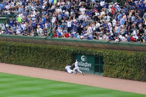 Ian Happ and Pete Crow-Armstrong nearly collide 