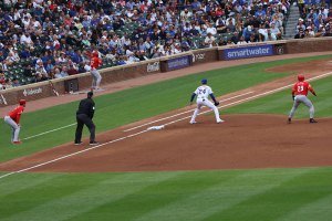 Reds runner leads off first