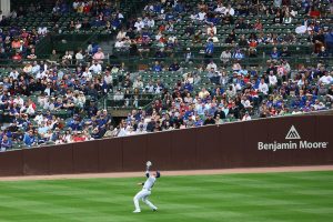 Ian Happ catches ball in left field