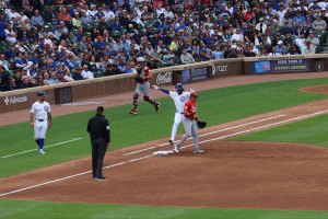 Kevin Alcantara runs to first base