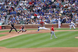 Nico Hoerner dives to slid into home