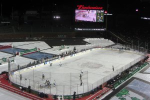 Video screen beyond action on the ice