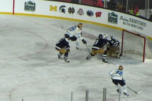 Action in front of Penn State goalie