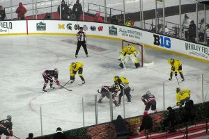 Face off on the Wolverines end of the ice