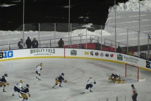 Notre Dame player prepares to shoot the puck