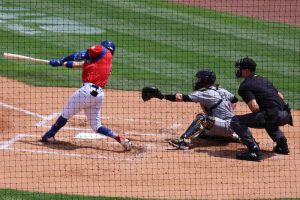 Cubs batter swiging bat