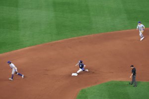 Man rounding second