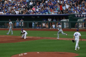 Runner out at first by large margin